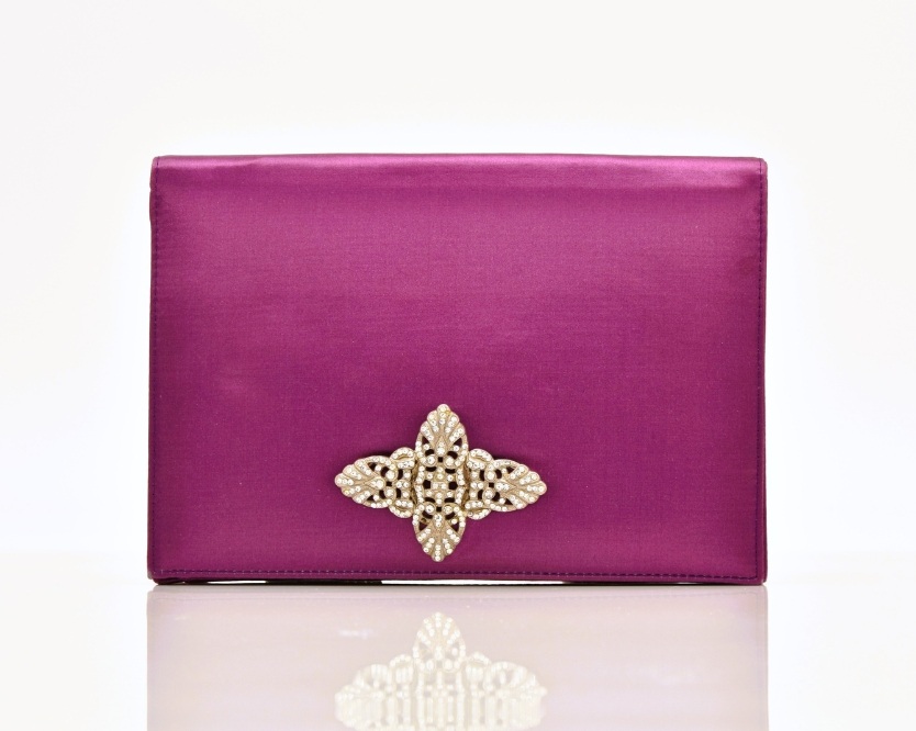 A mauve satin evening clutch bag, estimated at £4,000-6,000 (+fees) at Halls